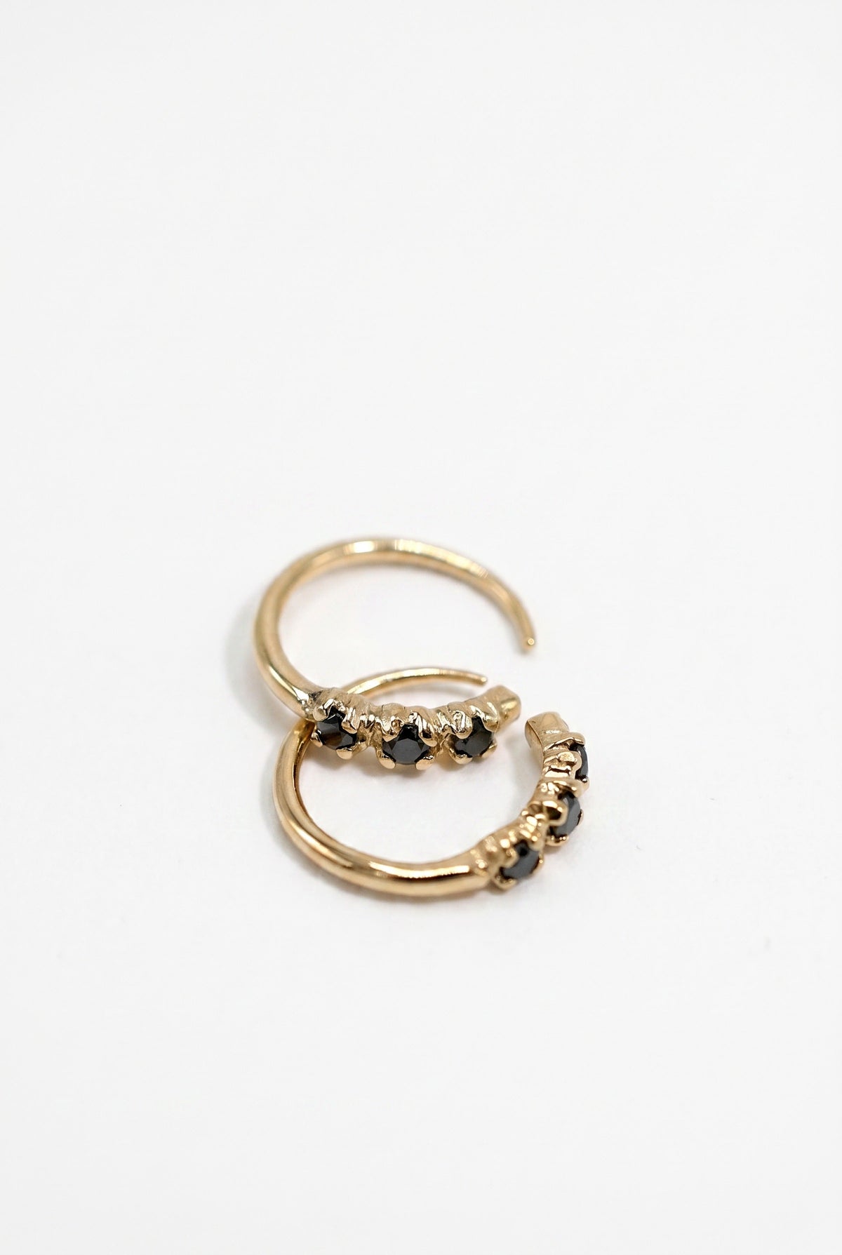 Black Diamond Huggie Earrings Gold
